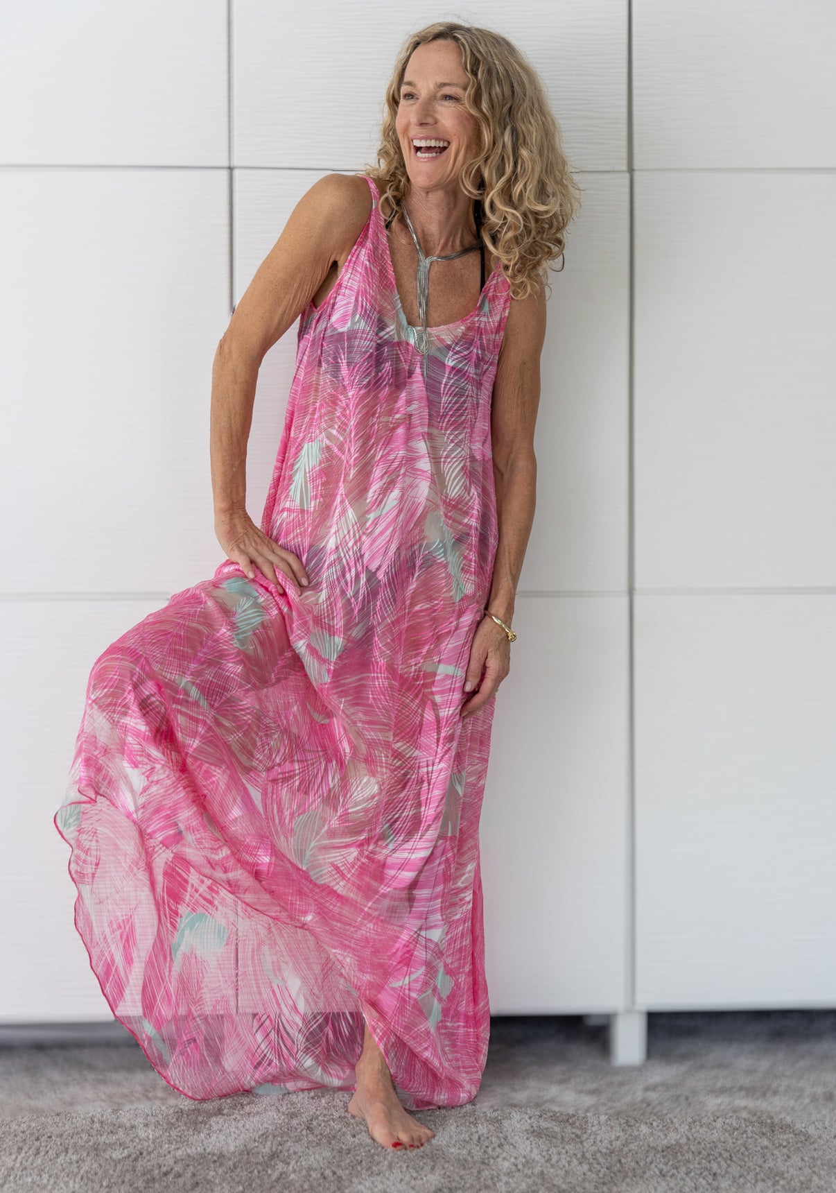 Soul Wild French silk resortwear dress in abstract desert print worn open over a bikini, captured in natural sunlight for Preema Aura’s Soul Series.