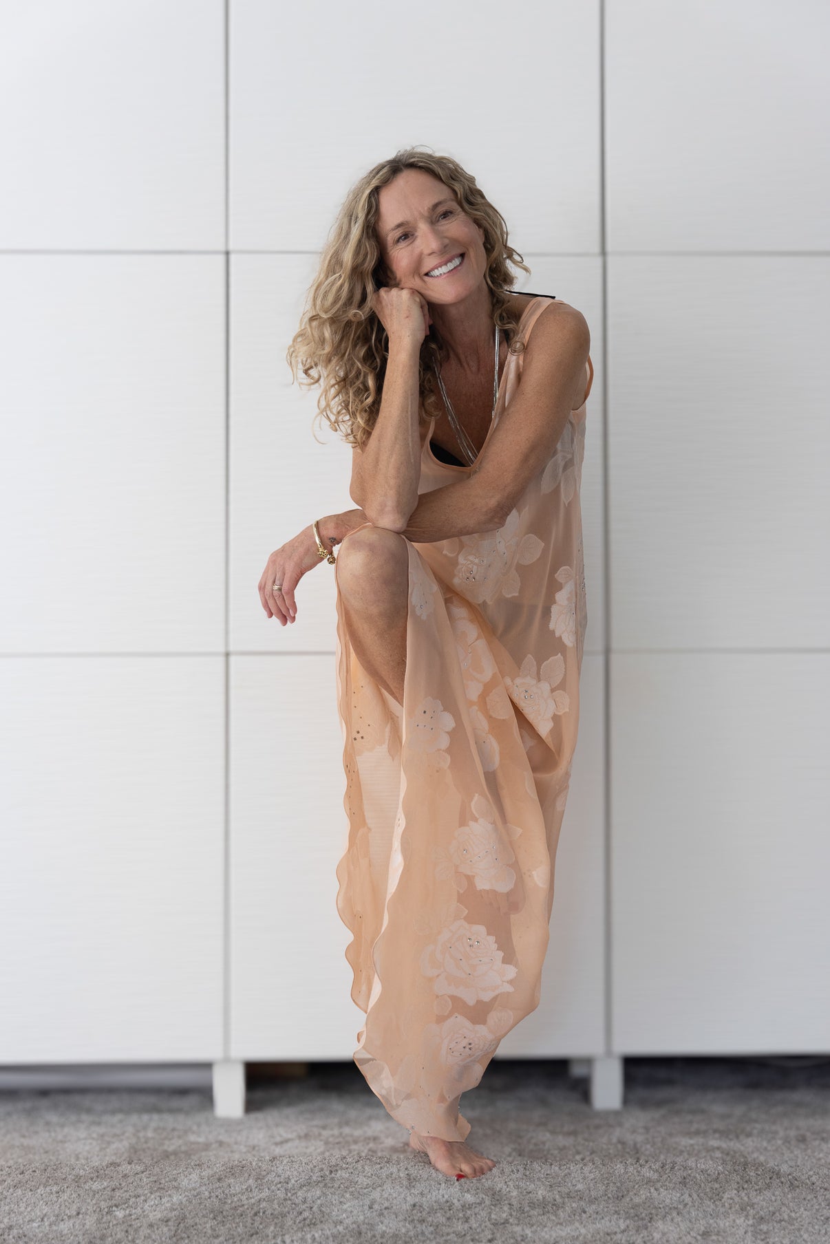 Soul Bloom by Preema Aura styled casually over a bikini, highlighting the relaxed fit and soft sheer floral detailing.