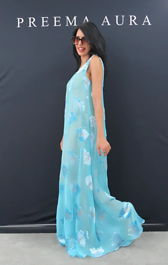 Side profile of Preema Aura Soul Series Cascade dress – lightweight silk maxi in aqua blue with soft floral pattern and breezy movement