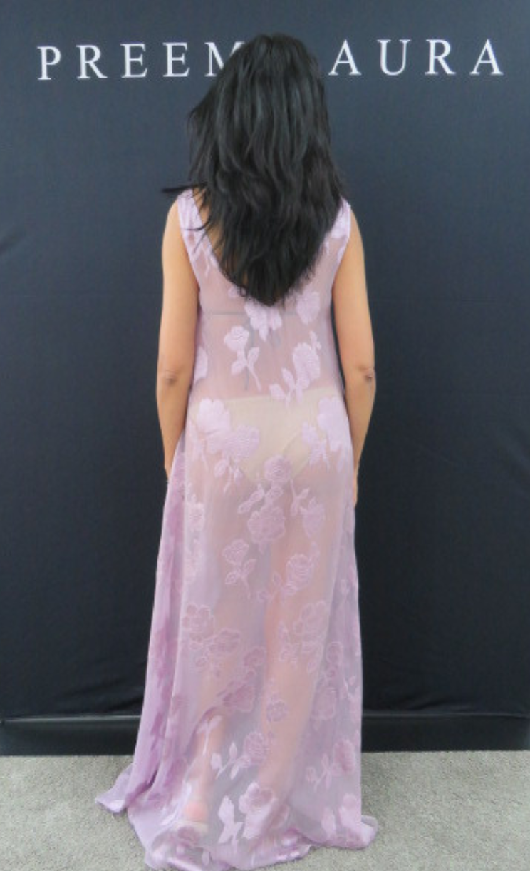 Back view of Preema Aura Soul Series Dusk dress – floor-length translucent lilac gown with soft rose detailing and low V-back