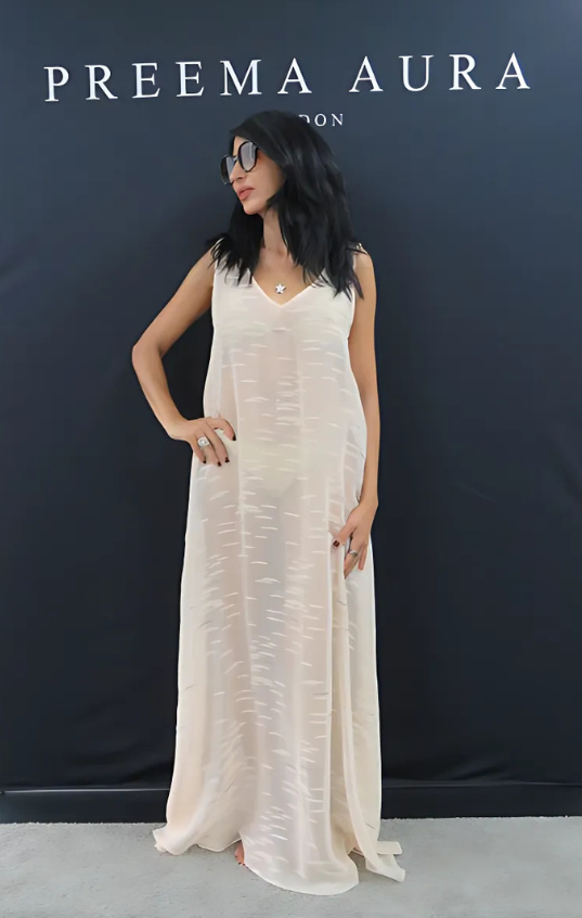 “Model in Soul Flare Preema Aura dress, featuring lightweight cream silk with silver woven detail”