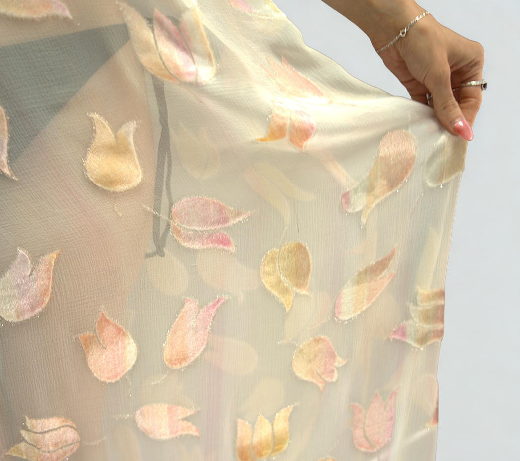 Close-up of Preema Aura Soul Glimmer dress – embroidered silk tulips in pastel tones with soft iridescent shimmer detail