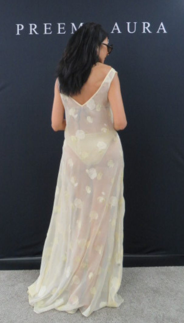 Back view of Preema Aura Soul Series Lune dress – lightweight translucent ivory gown with elegant floral detail and low V-back