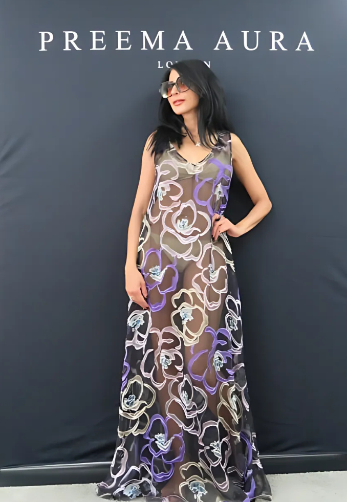 Model wearing Preema Aura Soul Series Mirage dress – sheer black silk gown with bold floral outlines in lilac, ivory, and soft gold
