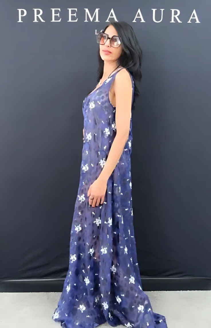 Side view of model in Preema Aura Soul Series Nightfall dress – luxury sheer navy maxi dress with white floral detailing and fluid movement.