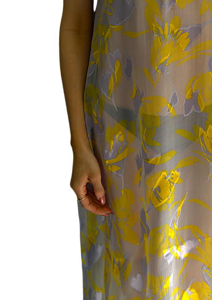 Model wearing the Soul Radiance dress from Preema Aura's Soul Series – a flowing, floor-length gown designed for effortless elegance, crafted in lightweight fabric for luxury resort wear and timeless occasion dressing.