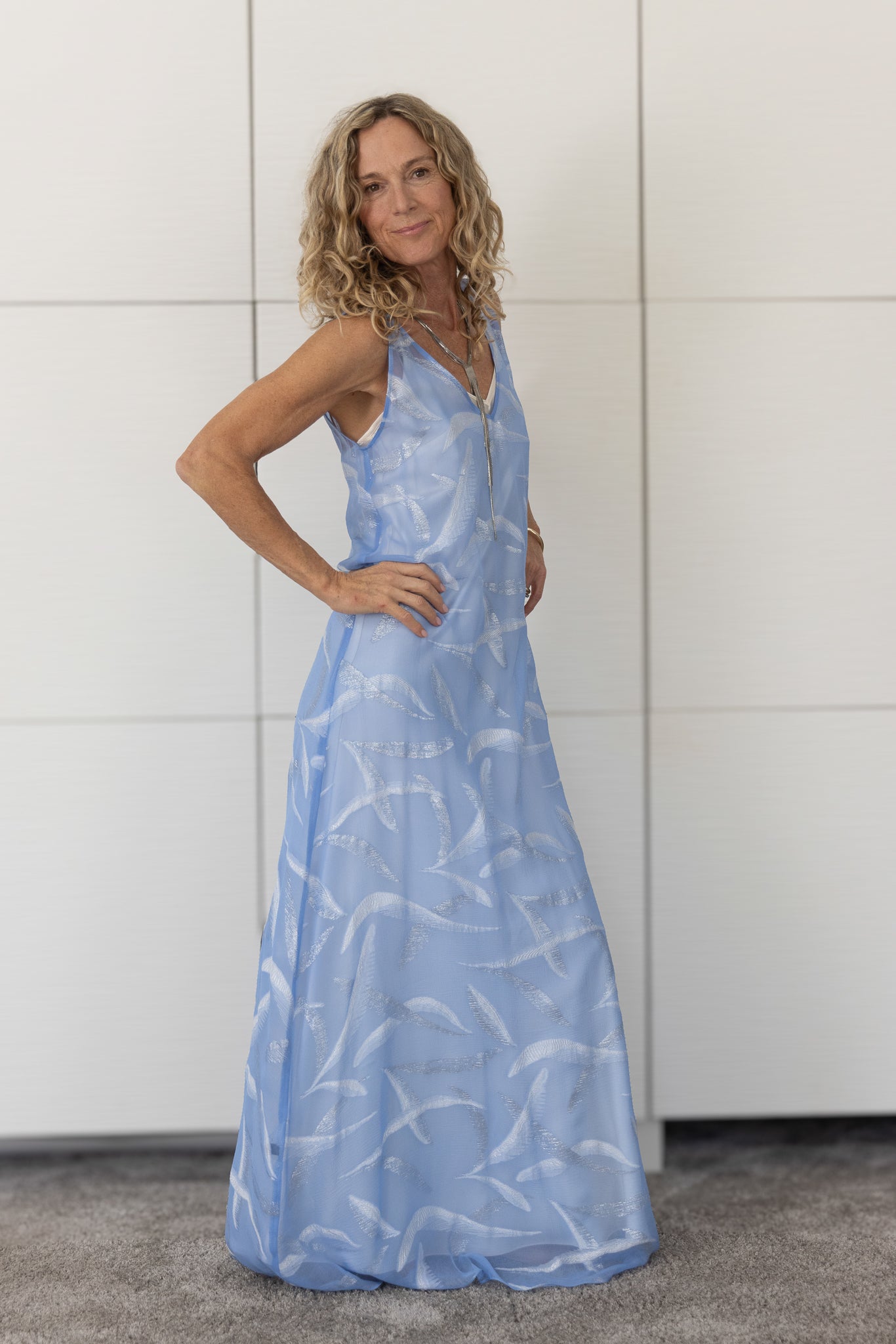 Soul Soar French silk A-line slip dress over a cream slip, showing its airy texture, gentle movement and soft cloud-like print from Preema Aura’s Soul Series.