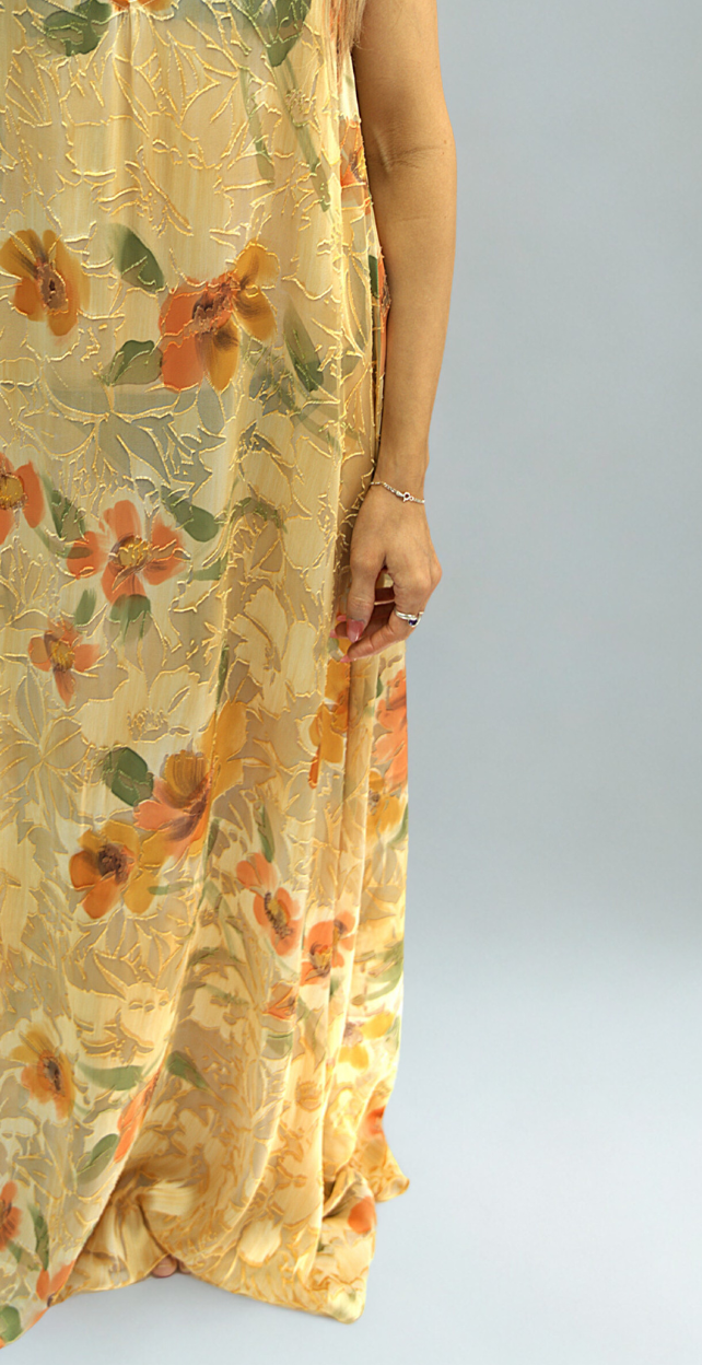 Detailed view of Preema Aura Soul Series Solstice silk fabric – yellow-toned sheer silk with textured floral embroidery and orange blossom pattern