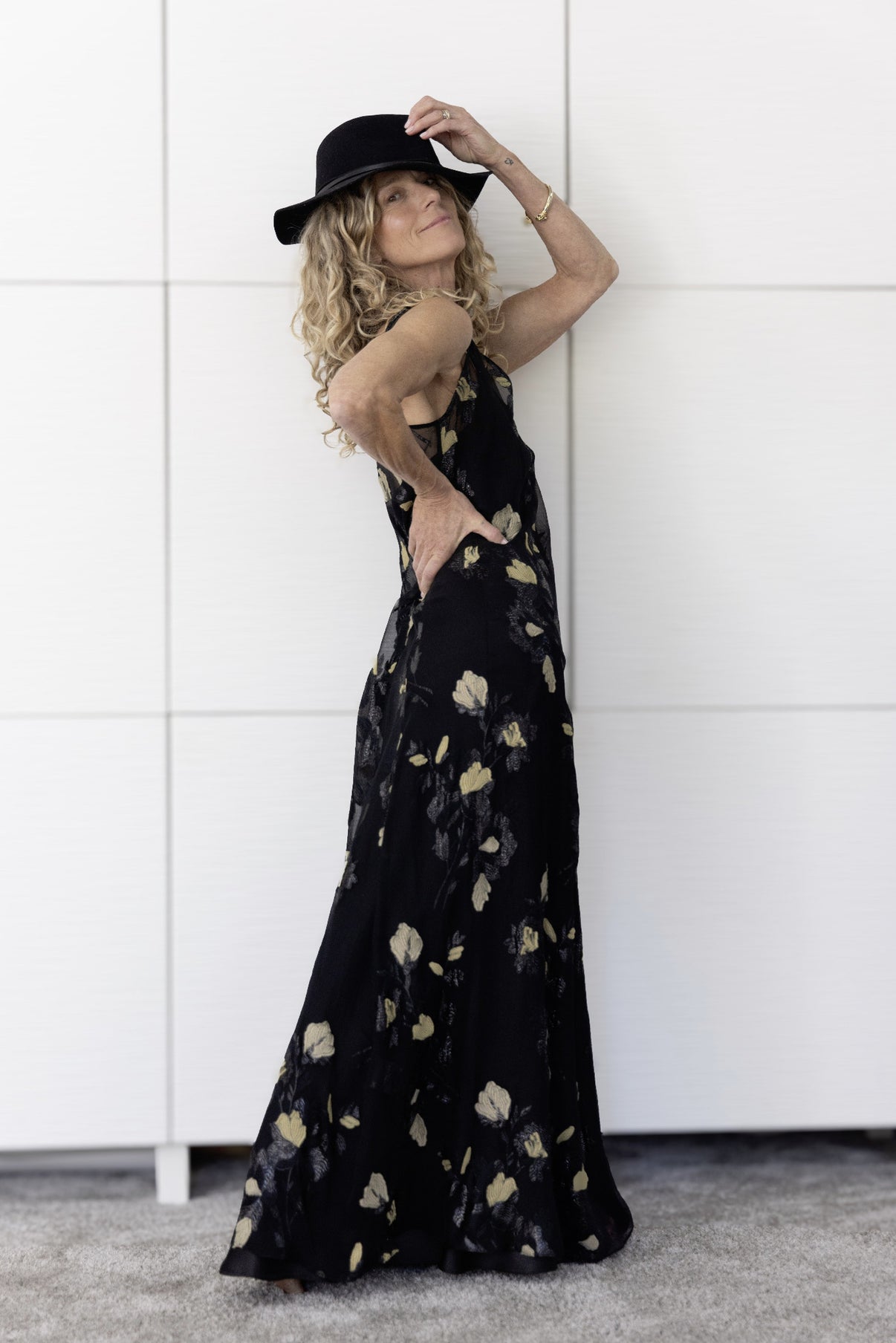 Preema Aura Soul Eclipse black sheer silk maxi dress styled over a black slip, highlighting its evening elegance and luxurious drape.