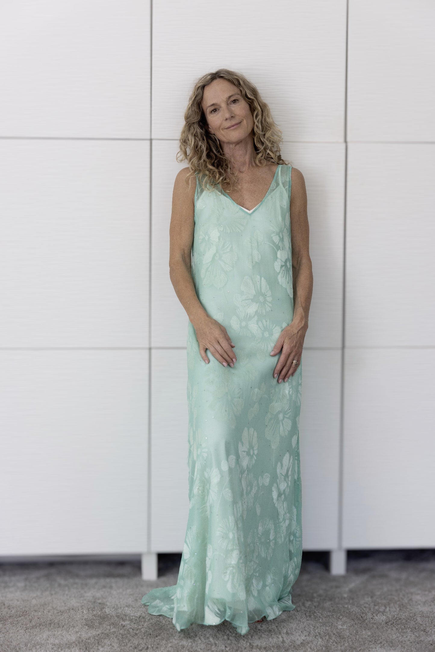 Preema Aura Soul Eden sheer silk mint-green maxi dress layered with a cream slip, radiating serenity and natural sophistication for sun-to-soirée wear
