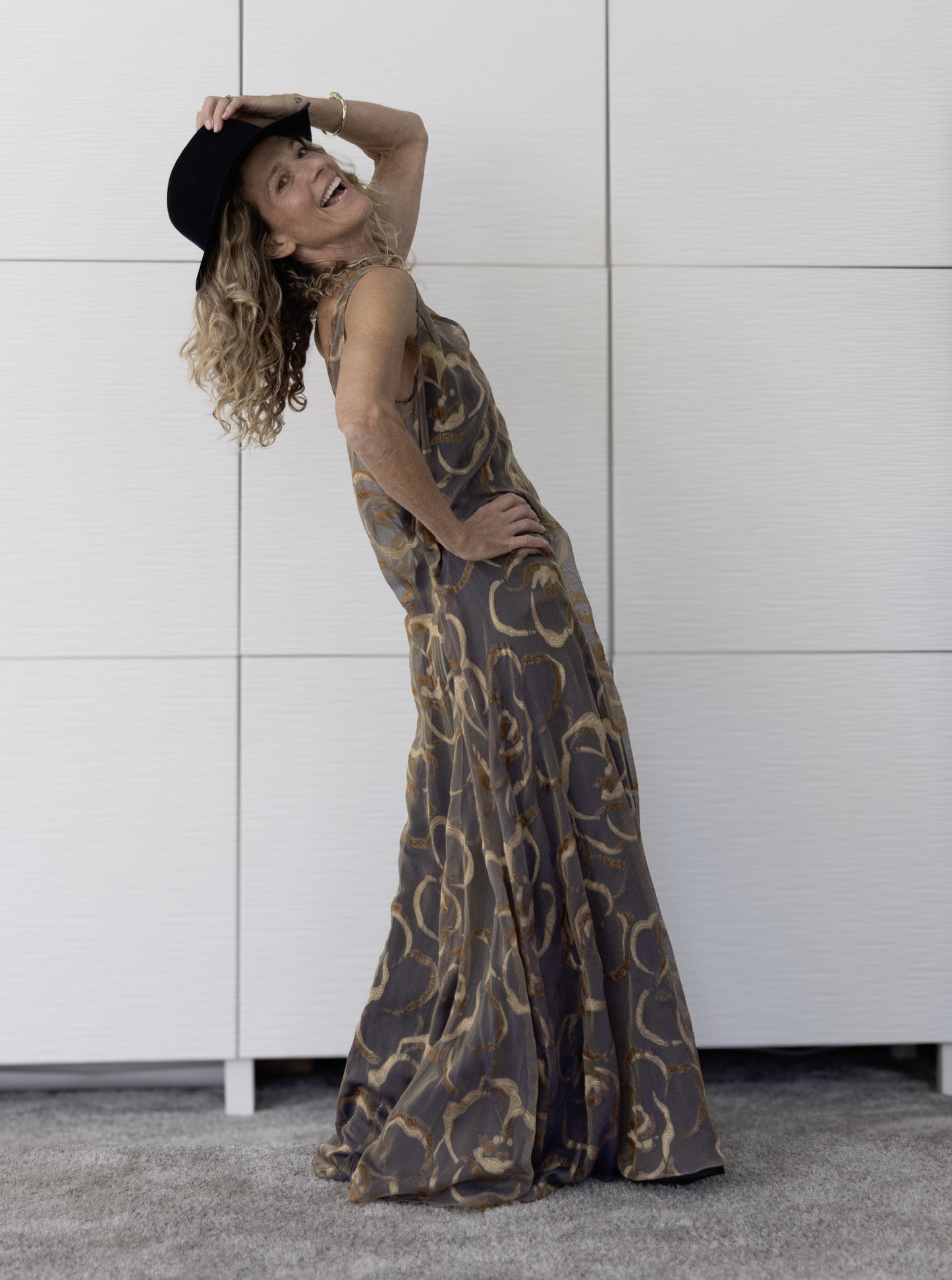 Preema Aura Soul Ember sheer silk maxi dress styled over a black slip, reflecting refined evening glamour and effortless sophistication.