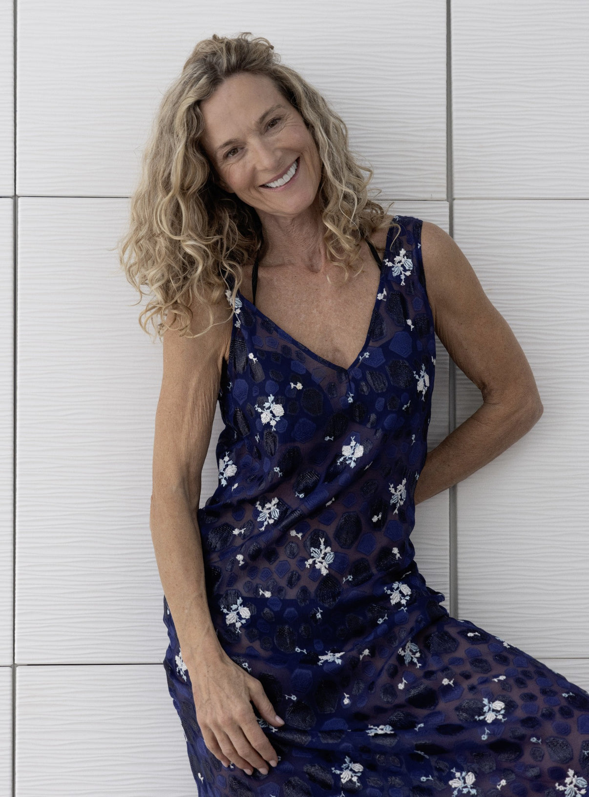 Close-up of Preema Aura Soul Nightfall dress showing soft V-neckline and intricate blue patterned fabric