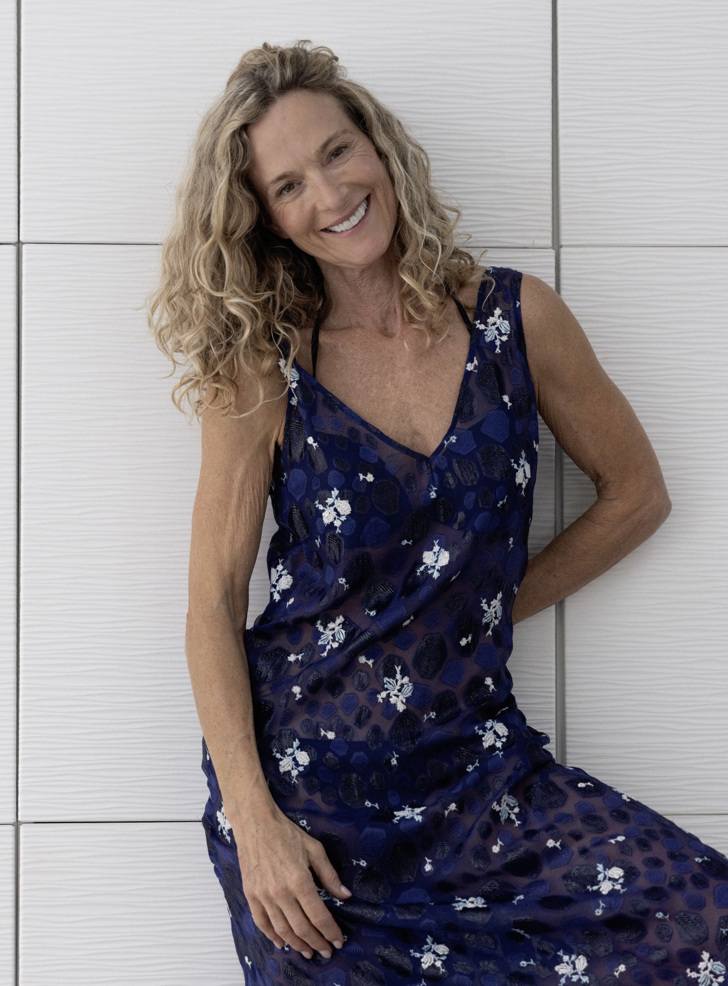 Close-up of Preema Aura Soul Nightfall dress showing soft V-neckline and intricate blue patterned fabric