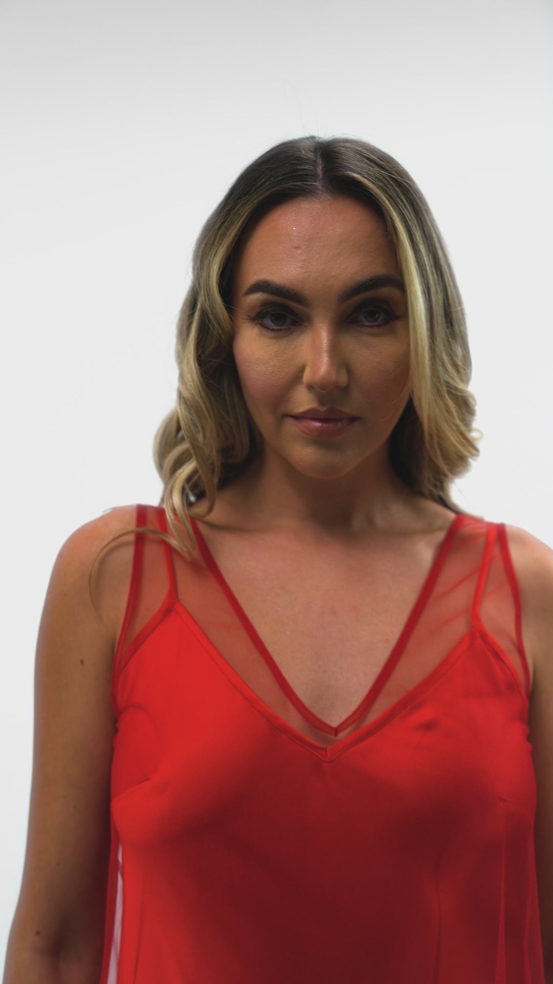 Enchanted Ember dress by Preema Aura - a flowing red dress with glitter detailing