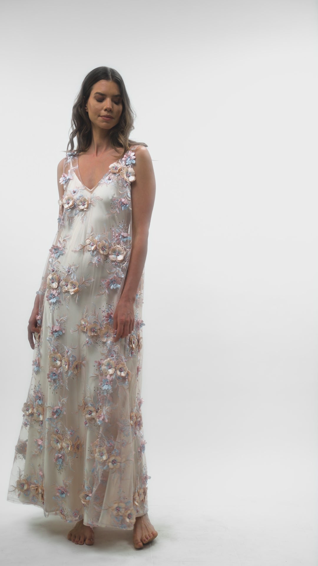 Petal Mist by Preema Aura - a flowing sheer dress with floral embellishments, worn over a cream slip