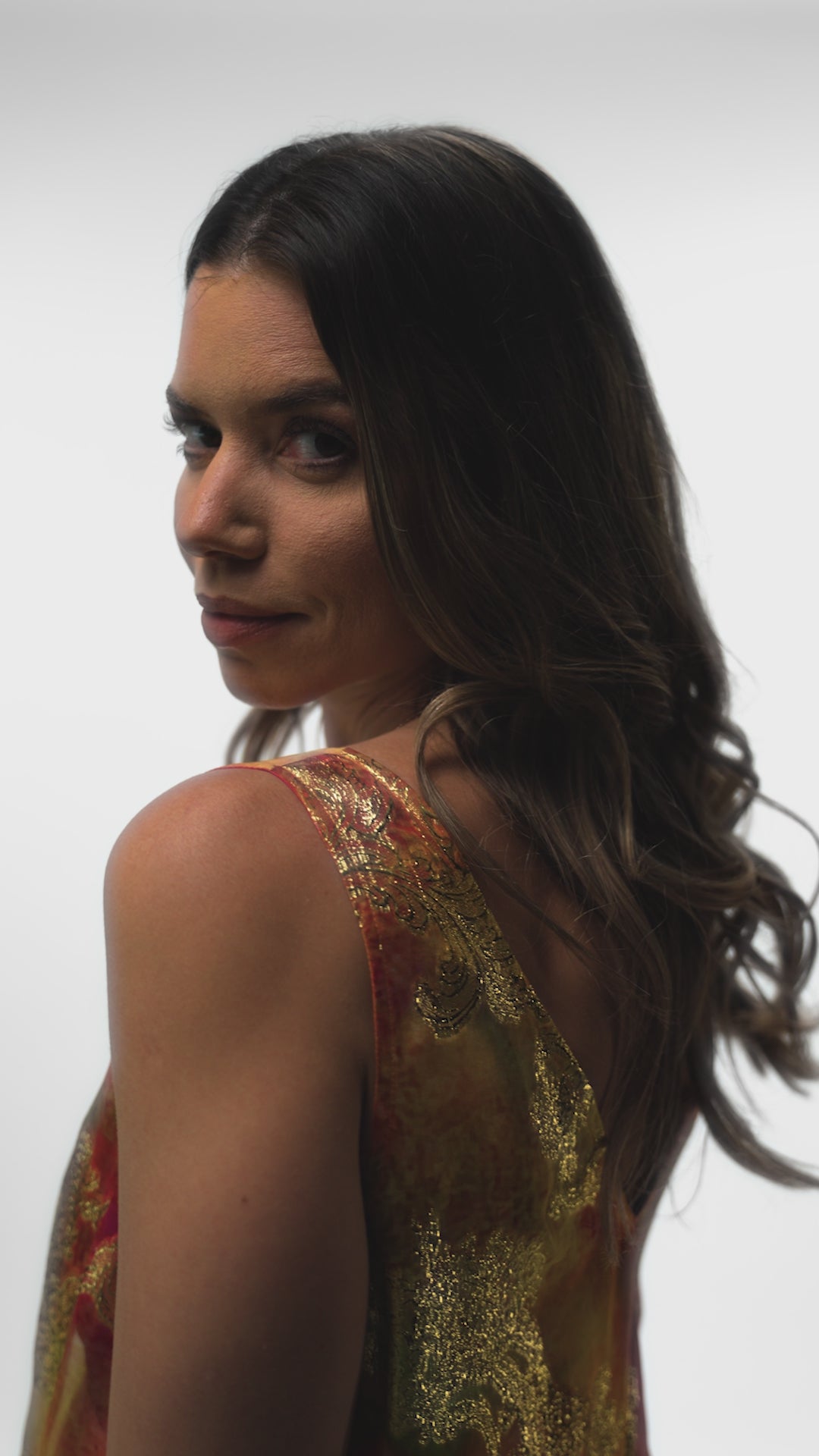 Mystique Horizons dress by Preema Aura - a flowing, vibrant dress in red, orange and gold