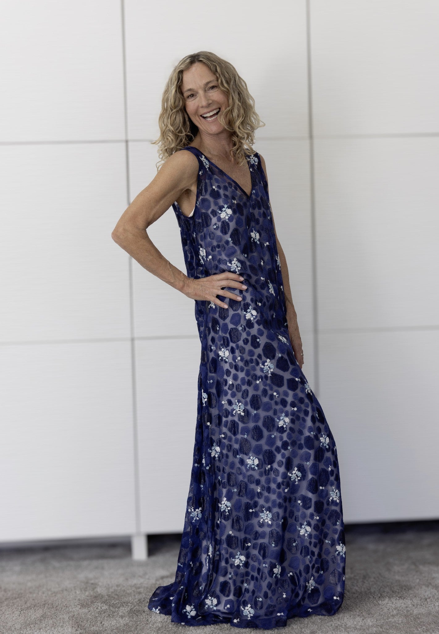 Preema Aura Soul Nightfall dress layered over cream slip, highlighting translucent fabric and floral shimmer for luxury resortwear look